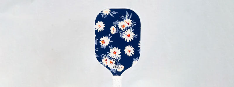 floral pattern pickleball paddle with white handle