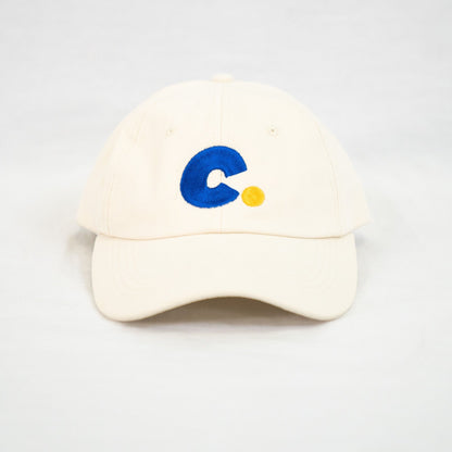 club. logo cream pickleball hat with blue logo